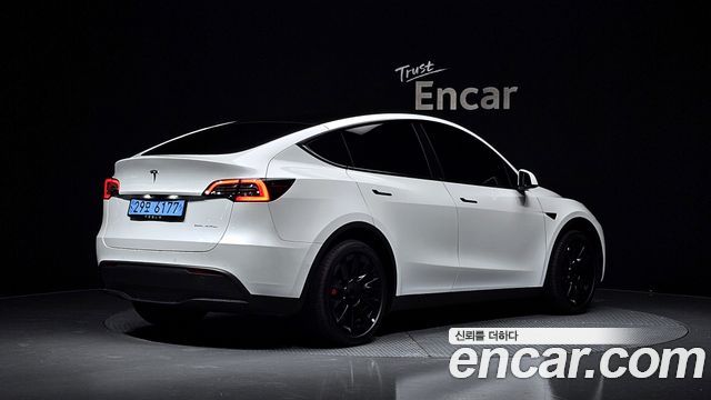 Tesla Model Y Long Range AWD — пробег 49 611 км — фото 2 из 5