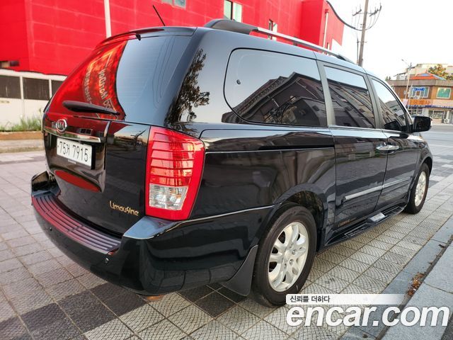 Kia Carnival Grand Carnival GLX Luxury — пробег 200 000 км — фото 4 из 5