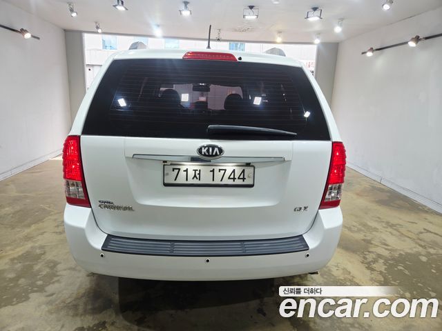 Kia Carnival Grand Carnival GLX Premium — пробег 116 600 км — фото 4 из 5