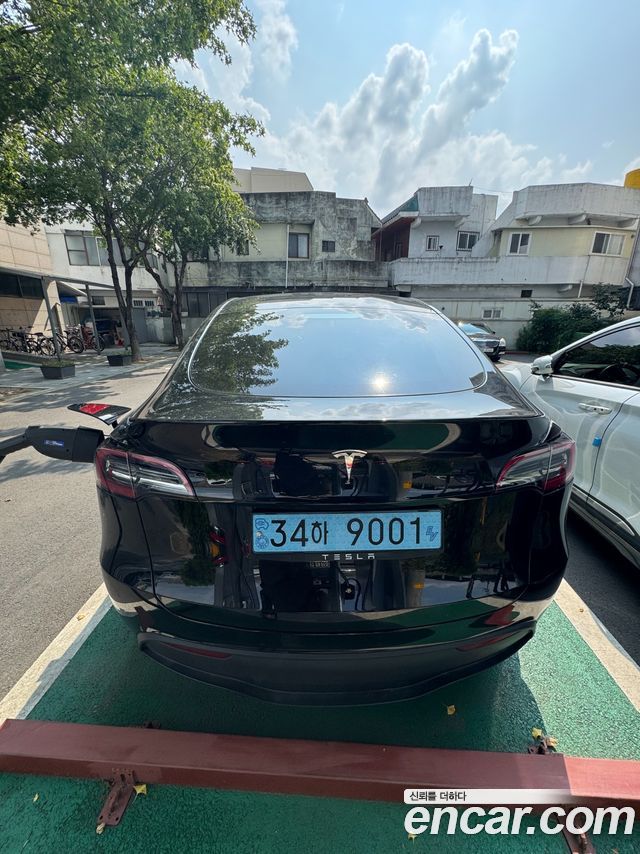 Tesla Model Y RWD — пробег 27 983 км — фото 4 из 5