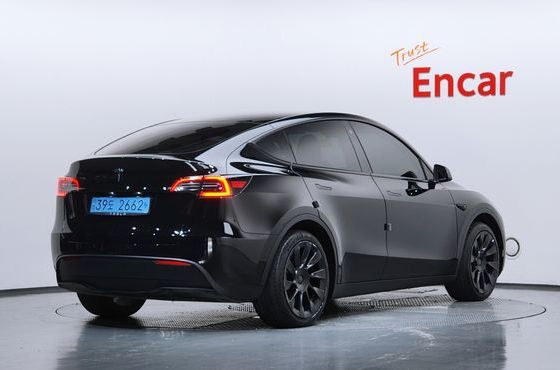 Tesla Model Y RWD — пробег 40 987 км — фото 2 из 5