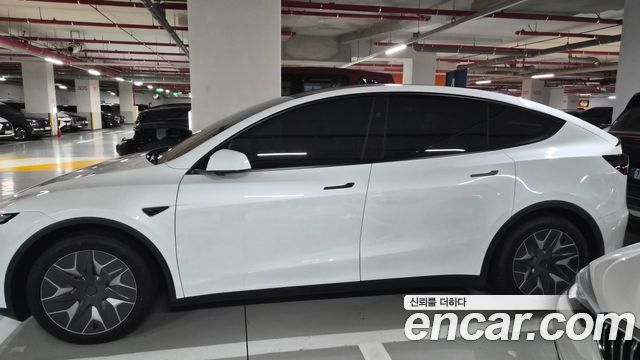 Tesla Model Y L Long Range AWD — пробег 1 200 км — фото 3 из 5