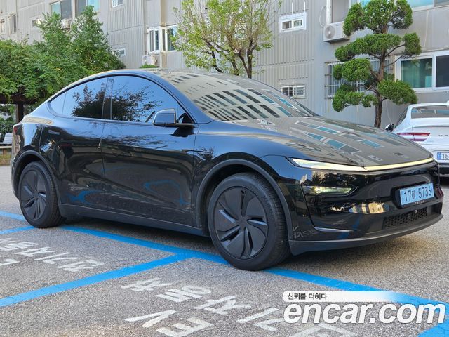 Tesla Model Y Long Range AWD — пробег 24 500 км — фото 3 из 5