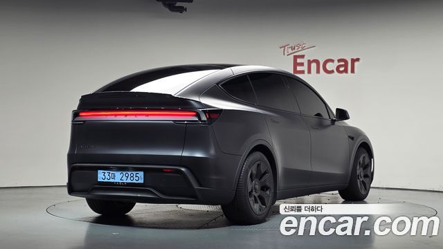 Tesla Model Y L Long Range AWD — пробег 10 007 км — фото 2 из 5