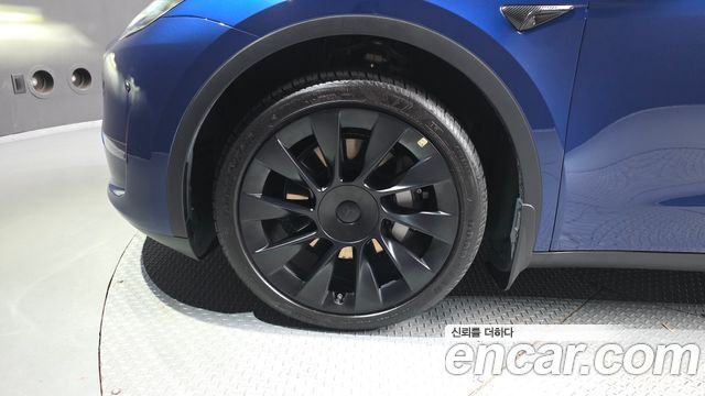 Tesla Model Y Long Range AWD — пробег 52 604 км — фото 5 из 5