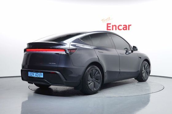 Tesla Model Y Long Range AWD — пробег 26 579 км — фото 2 из 5