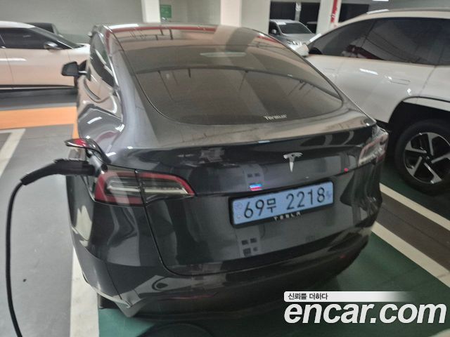 Tesla Model Y RWD — пробег 11 000 км — фото 4 из 5