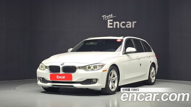 BMW 3-Series 320d Touring — пробег 288 816 км — фото 1 из 5