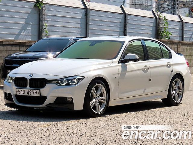 BMW 3-Series 330i M Sport — пробег 164 620 км — фото 2 из 5