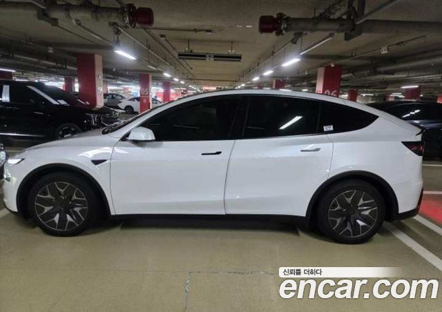 Tesla Model Y L Long Range AWD — пробег 1 км — фото 2 из 5