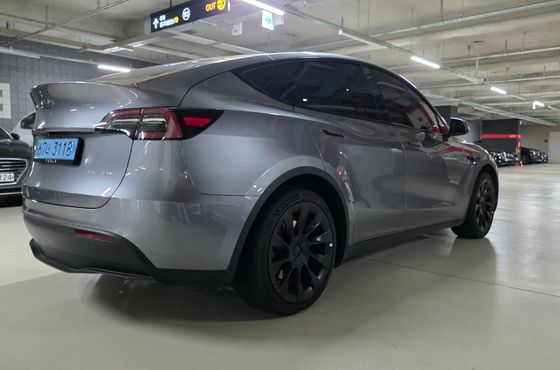 Tesla Model Y Long Range AWD — пробег 56 400 км — фото 2 из 5