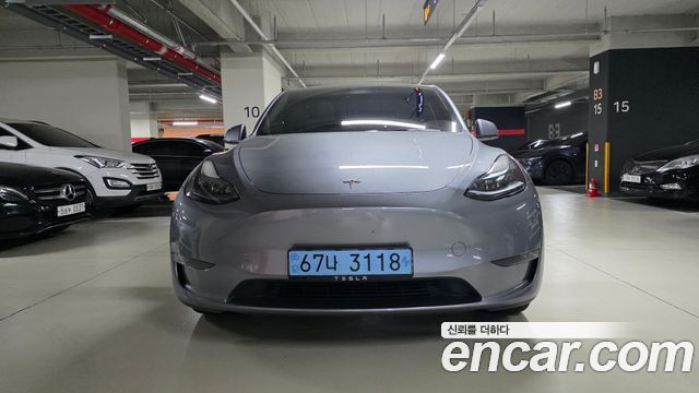 Tesla Model Y Long Range AWD — пробег 56 400 км — фото 3 из 5