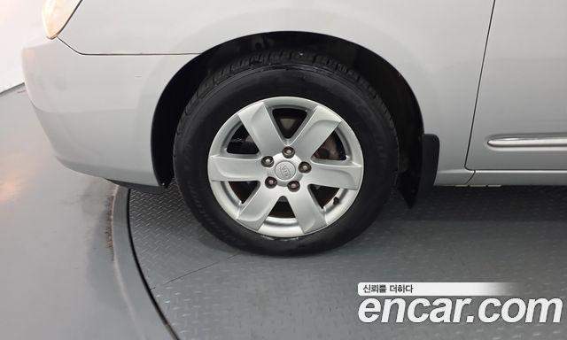 Kia Carens LPI 2.0 GLX Deluxe — пробег 130 011 км — фото 5 из 5