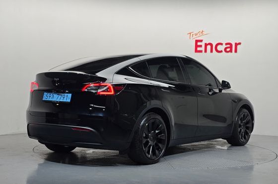 Tesla Model Y RWD — пробег 9 630 км — фото 2 из 5