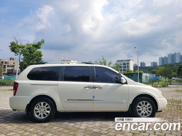 Kia Carnival Grand Carnival GLX Premium — пробег 124 267 км — фото 3 из 5