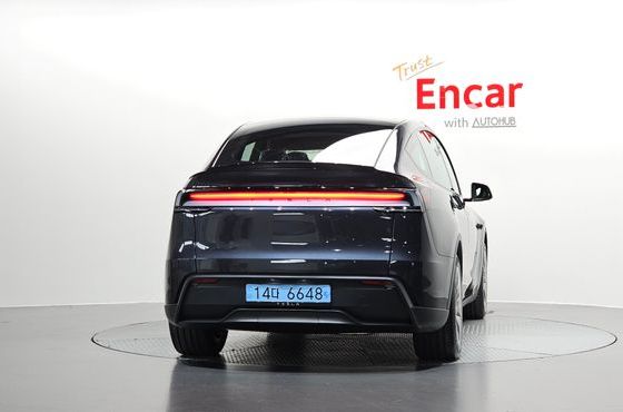 Tesla Model Y L Long Range AWD — пробег 62 км — фото 4 из 5