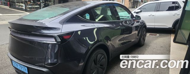 Tesla Model Y Premium RWD — пробег 4 241 км — фото 4 из 5