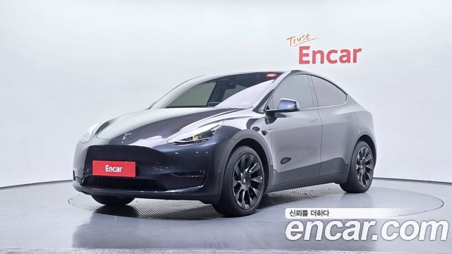 Tesla Model Y Long Range AWD — пробег 22 987 км — фото 1 из 5