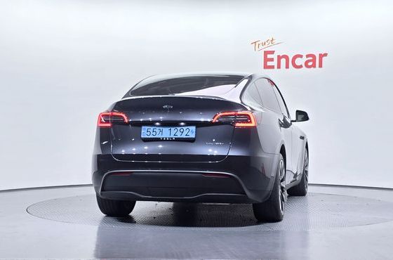 Tesla Model Y Long Range AWD — пробег 22 987 км — фото 4 из 5