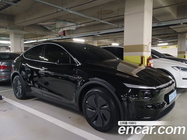 Tesla Model Y Premium Long Range AWD — пробег 865 км — фото 2 из 5