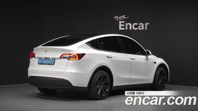 Tesla Model Y RWD — пробег 8 774 км — фото 2 из 5