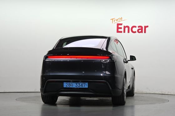 Tesla Model Y L Long Range AWD — пробег 73 км — фото 4 из 5