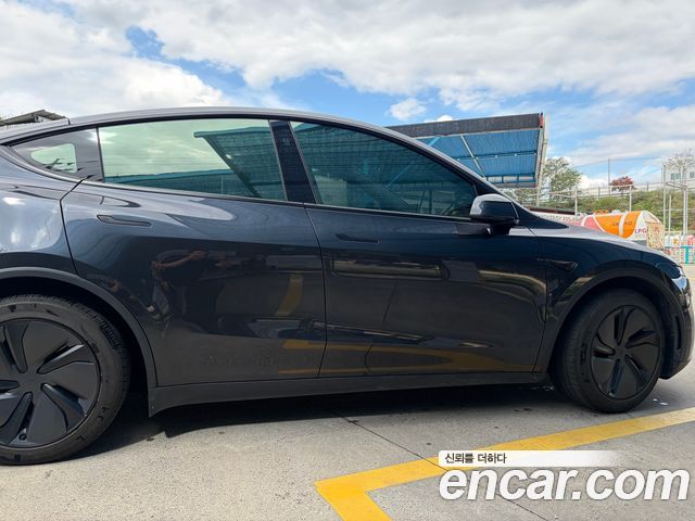 Tesla Model Y Long Range AWD — пробег 50 000 км — фото 3 из 5