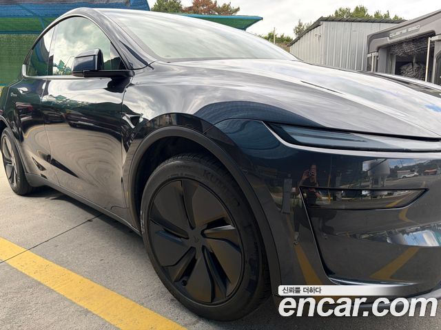 Tesla Model Y Long Range AWD — пробег 50 000 км — фото 5 из 5