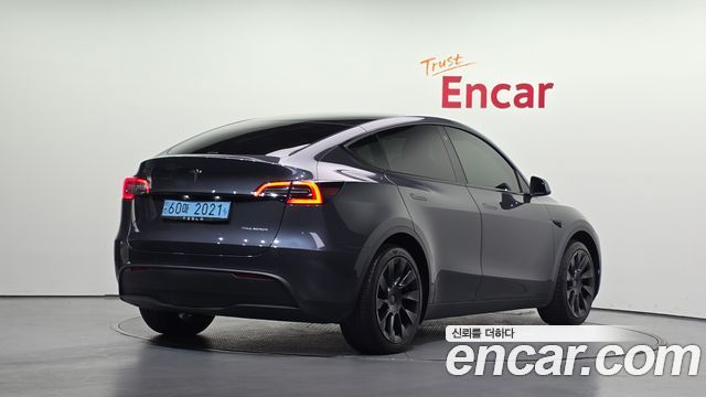 Tesla Model Y Long Range AWD — пробег 21 800 км — фото 2 из 5