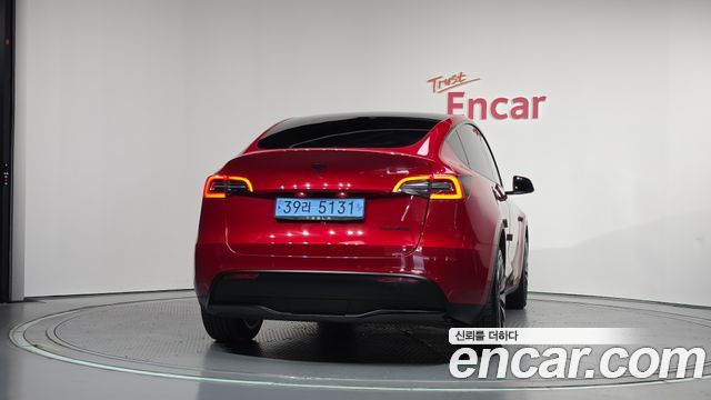 Tesla Model Y Long Range AWD — пробег 76 563 км — фото 4 из 5
