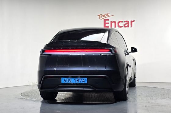 Tesla Model Y L Long Range AWD — пробег 3 228 км — фото 4 из 5