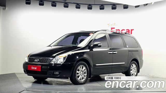 Kia Carnival Grand Carnival GLX Premium — пробег 116 223 км — фото 1 из 5