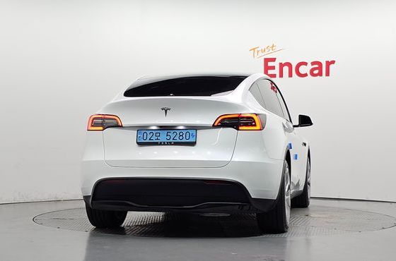 Tesla Model Y RWD — пробег 55 454 км — фото 4 из 5