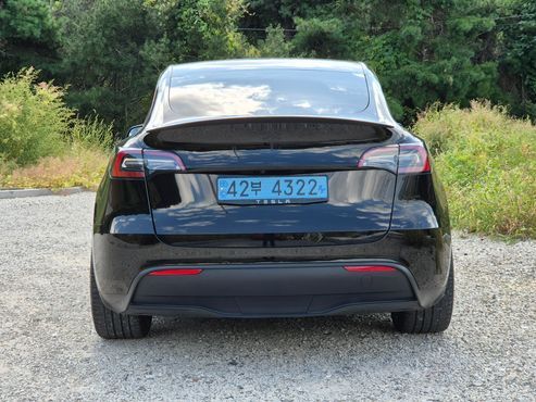 Tesla Model Y Standard Range RWD — пробег 76 994 км — фото 5 из 5