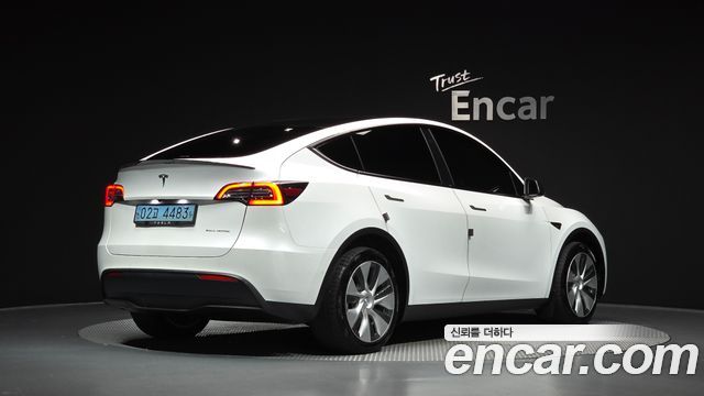 Tesla Model Y Long Range AWD — пробег 131 324 км — фото 2 из 5