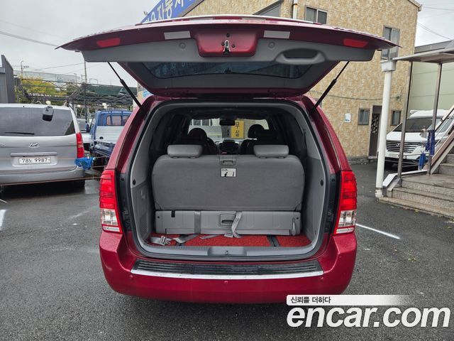 Kia Carnival Grand Carnival GLX Premium — пробег 296 500 км — фото 4 из 5