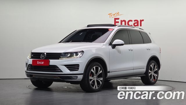 Volkswagen Touareg V6 3.0 TDI Bluemotion Premium 7P5 — пробег 135 704 км — фото 1 из 5
