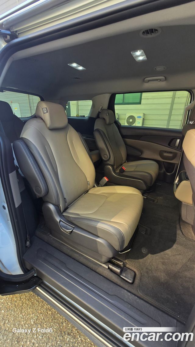 Kia Carnival HEV 9 seater Prestige — пробег 148 949 км — фото 4 из 5