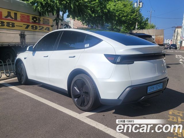 Tesla Model Y Premium RWD — пробег 2 100 км — фото 4 из 5