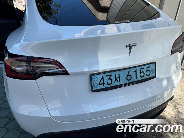 Tesla Model Y Standard Range RWD — пробег 103 200 км — фото 2 из 5
