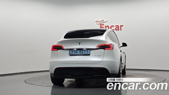 Tesla Model Y Long Range AWD — пробег 65 815 км — фото 4 из 5