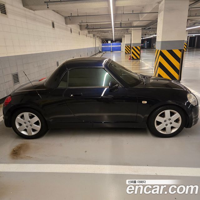 Daihatsu Copen 0.6 — пробег 89 000 км — фото 5 из 5
