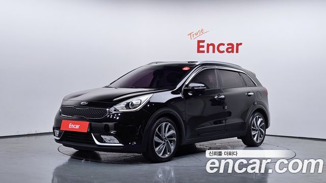 Kia Niro Prestige — пробег 105 994 км — фото 1 из 5