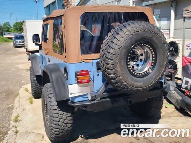 Jeep Wrangler 4.0 — пробег 170 000 км — фото 2 из 5