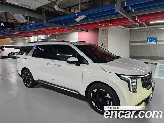 Kia Carnival HEV 9seater Signature — пробег 2 900 км — фото 2 из 5