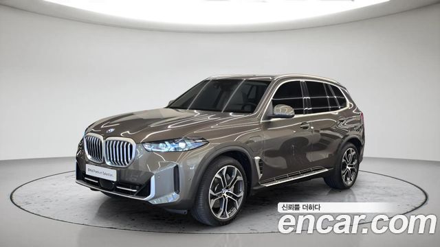 BMW X5 xDrive 50e xLine — пробег 4 506 км — фото 1 из 5