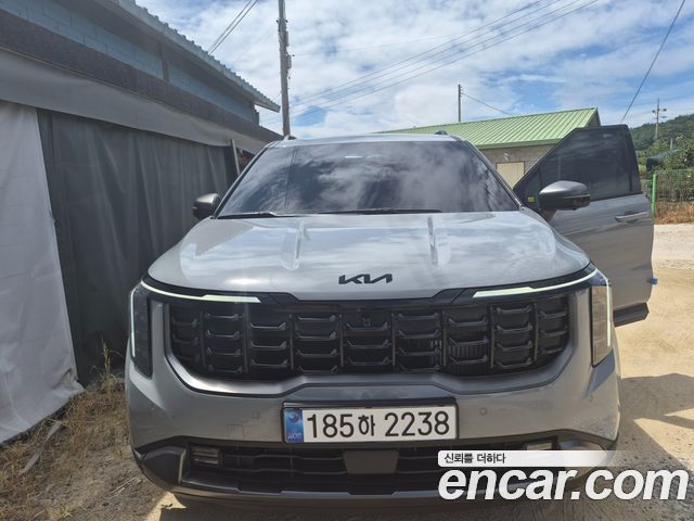 Kia Carnival HEV 7-Seater X Line — пробег 1 000 км — фото 1 из 5