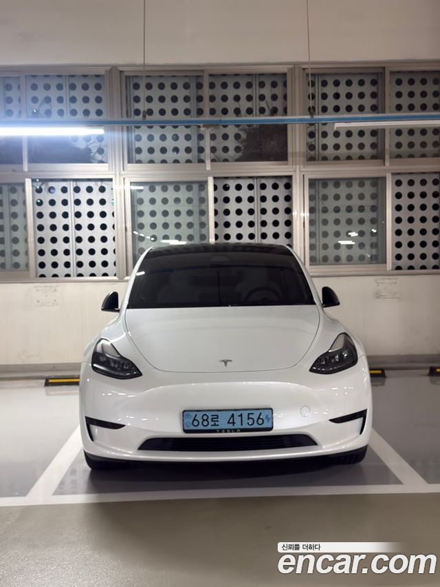 Tesla Model Y RWD — пробег 59 927 км — фото 1 из 5