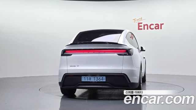 Tesla Model Y L Long Range AWD — пробег 4 998 км — фото 4 из 5