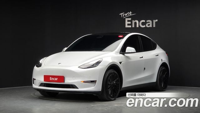 Tesla Model Y Standard Range RWD — пробег 61 327 км — фото 1 из 5